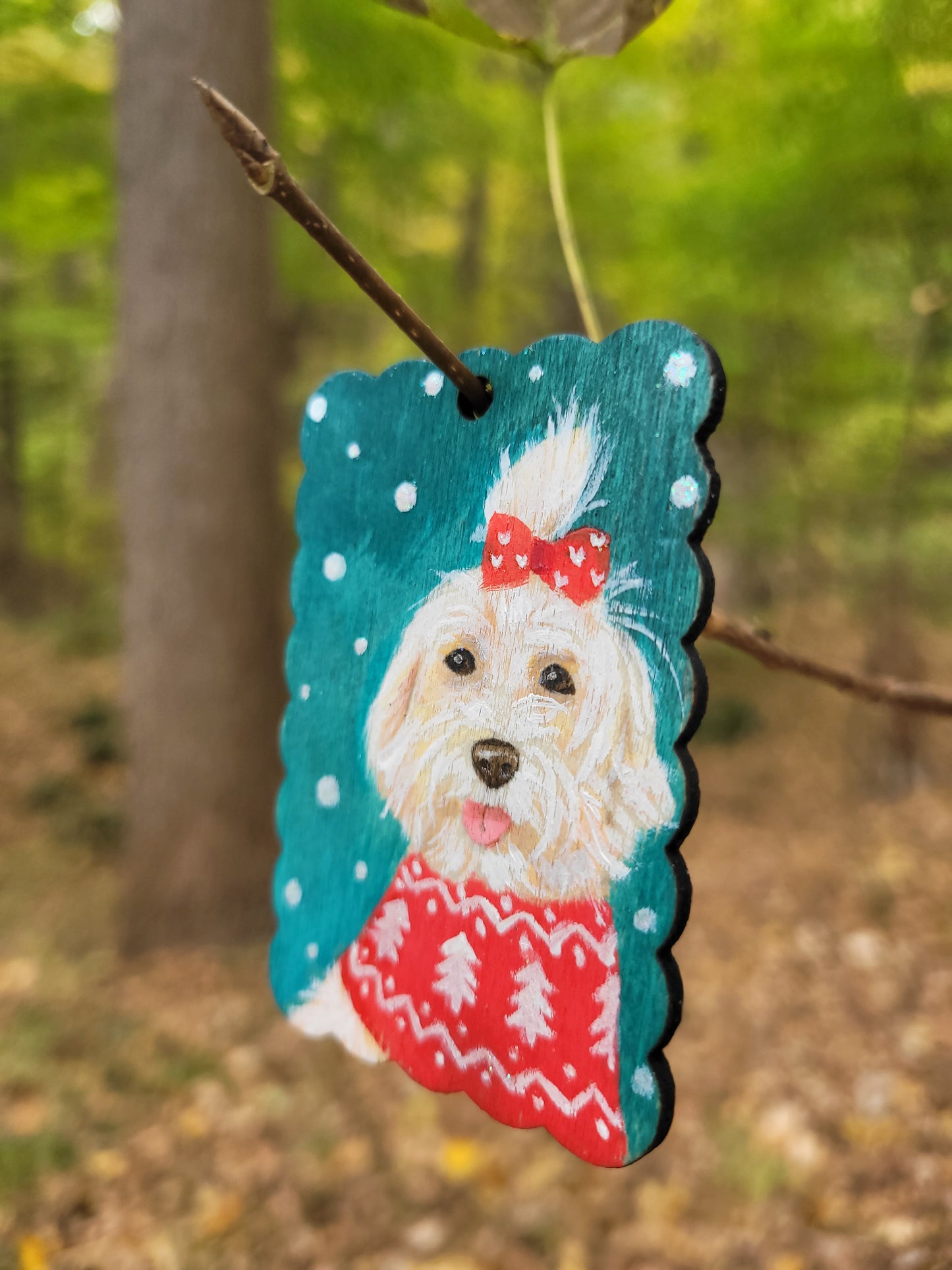 Eco-friendly dog Christmas ornament wood tag, featuring a dog in a holiday sweater.