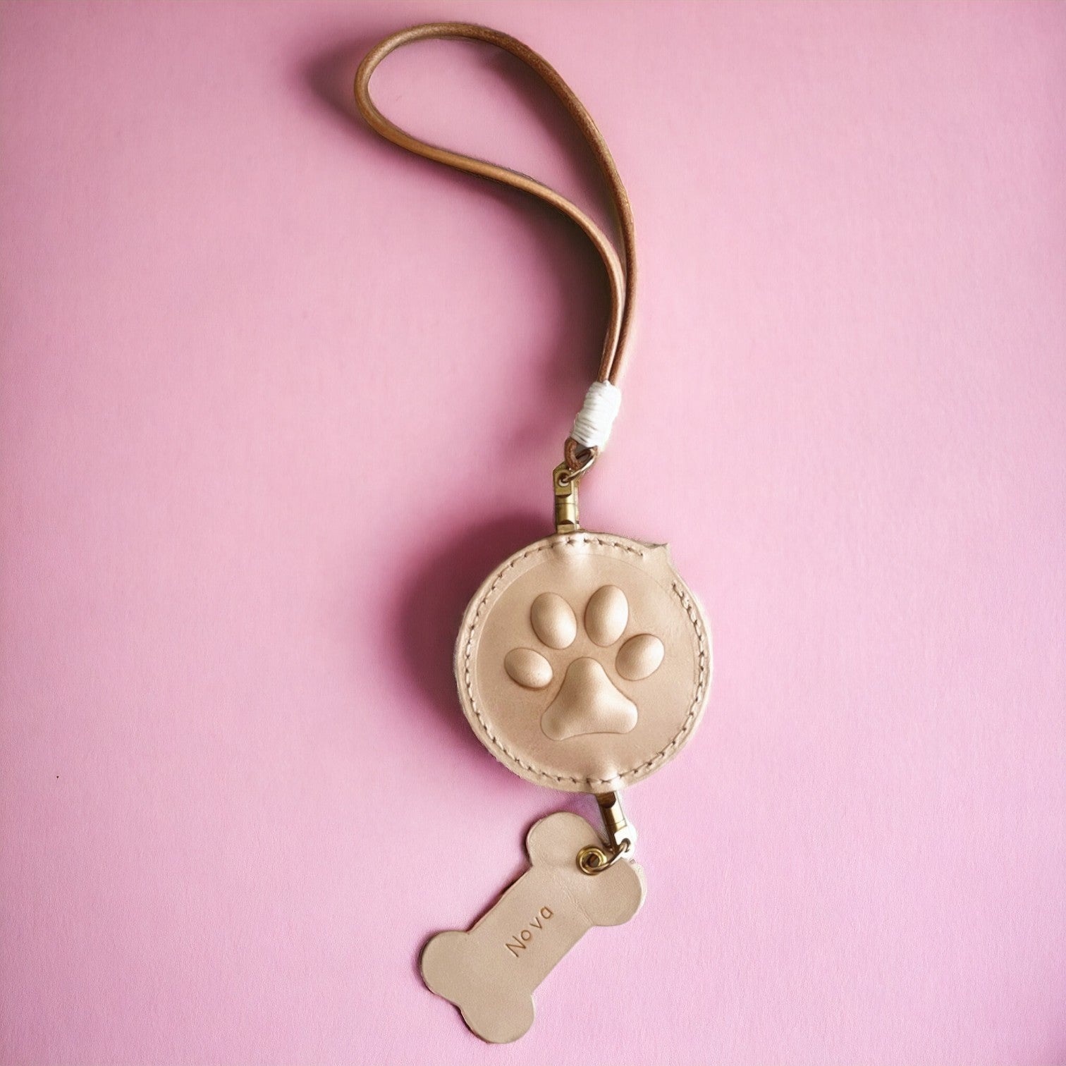Back view of custom made handcrafted pet portrait car mirror charm with 3D paw design