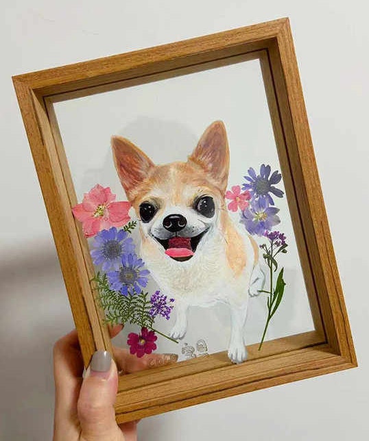 Personalized glass painting of a smiling corgi, hand-painted and framed in wood.