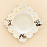 Pet portrait plate with three hand-painted pet portraits on cream