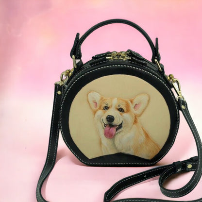Custom hand-painted and hand-stitched pet portrait handbag, featuring a 3D engraved and personalized depiction of a beloved pet on vegan tanned leather with PU leather accents and metal details, ideal for pet lovers.