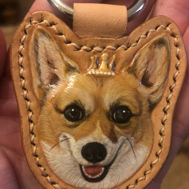 Custom pet portrait of a Corgi dog on a leather keychain, personalized artwork with a small crown