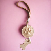 Back view of custom made handcrafted pet portrait car mirror charm with 3D paw design