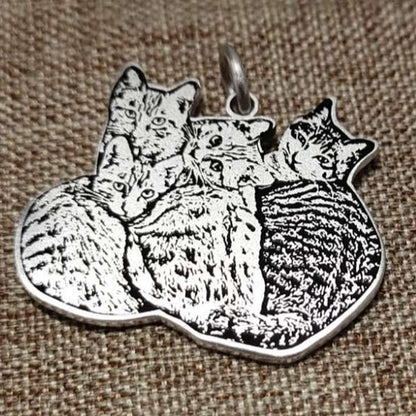 Sterling silver custom pet portrait engraving pendant featuring multiple cats, detailed and beautifully handcrafted.