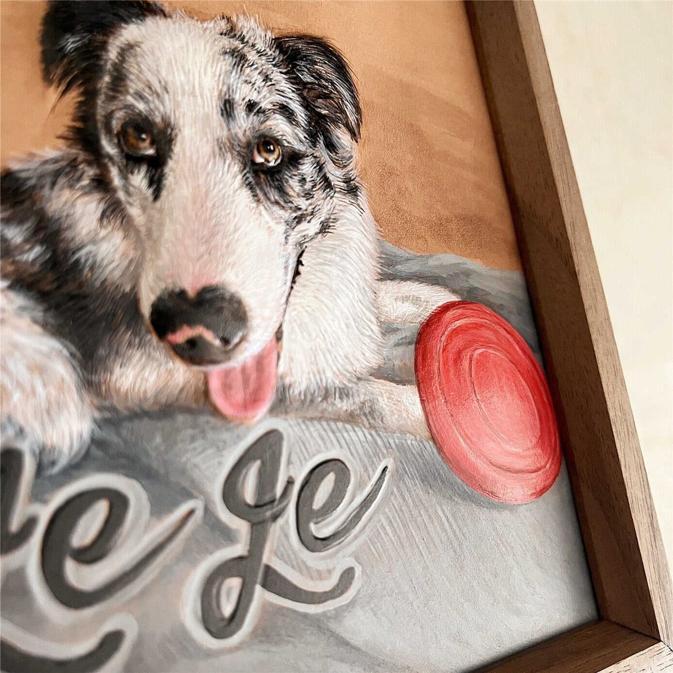 Side angle view of the custom pet portrait hand-carved leather frame with the name 'Le Le'