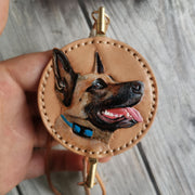 Front view, close-up details of personalize handcrafted leather engraving pet portrait car mirror charm with 3D dog portrait