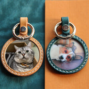 Customizable handcrafted keychain of cat and dog pet portraits in orange and green variation